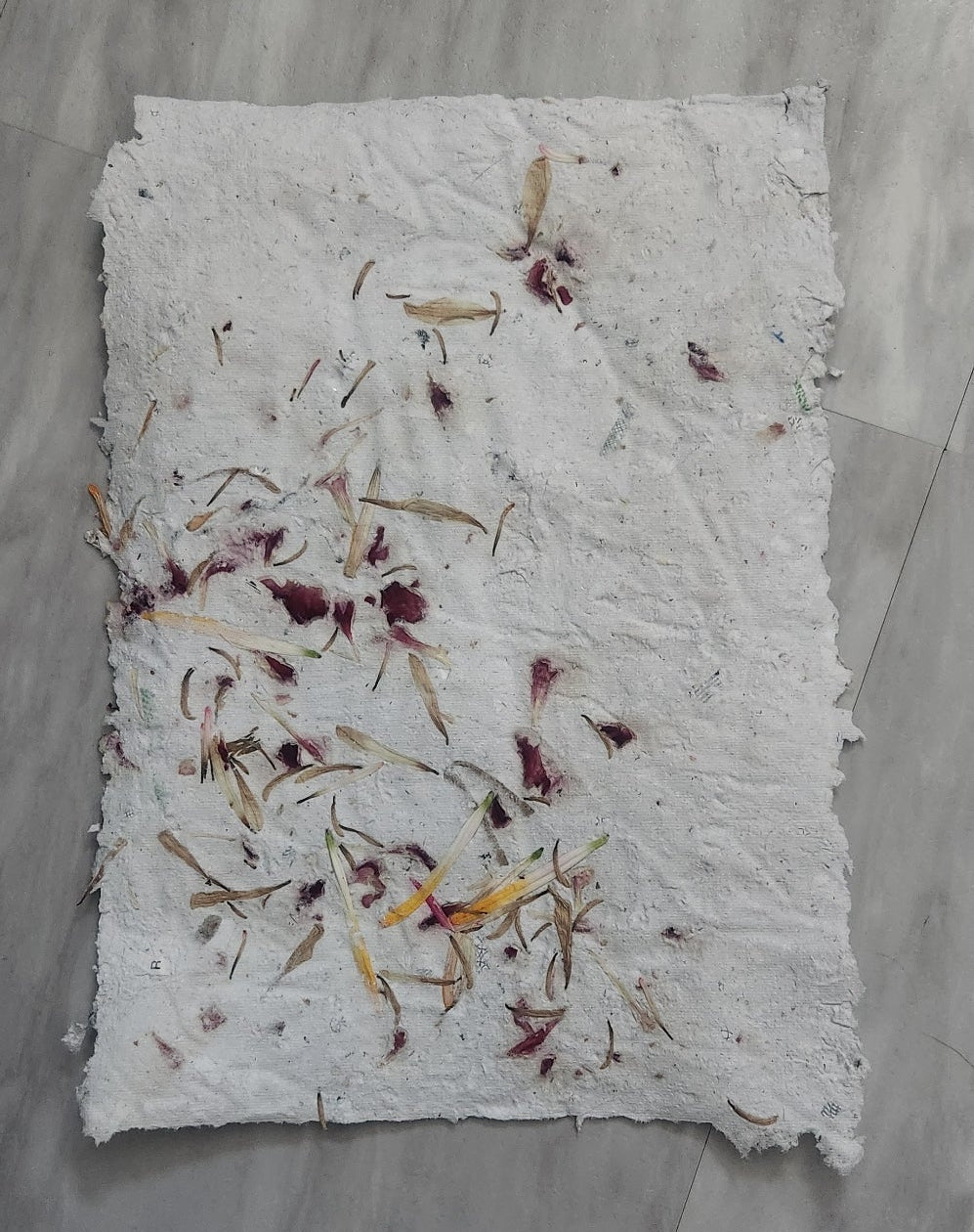 handmade recycled paper with flower petals