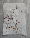 handmade recycled paper with flower petals