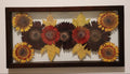 Framed pressed red orange and yellow flowers